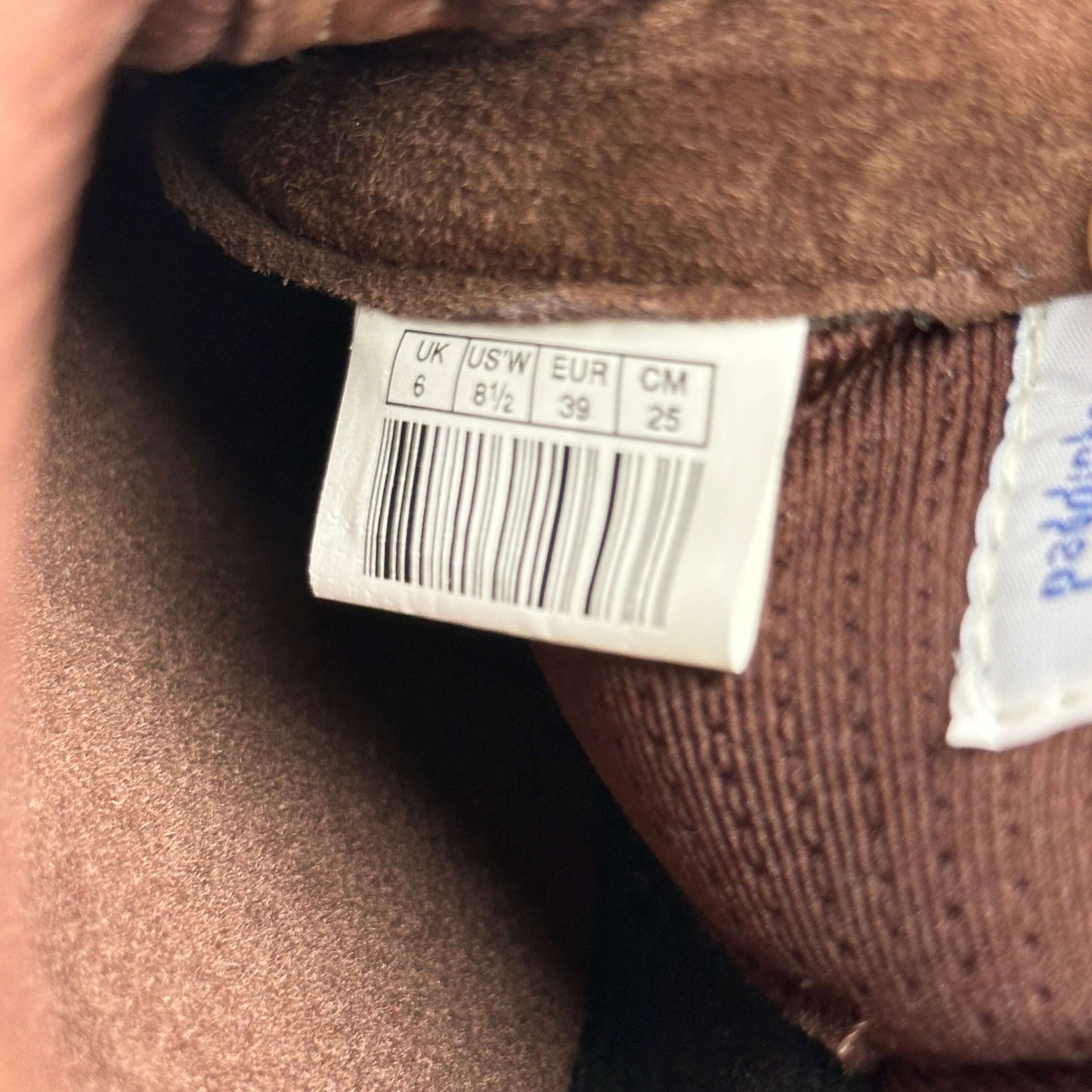 Puma speedcat size tag showing UK 6, US 8.5, EUR 39 for preloved sustainable trainers.