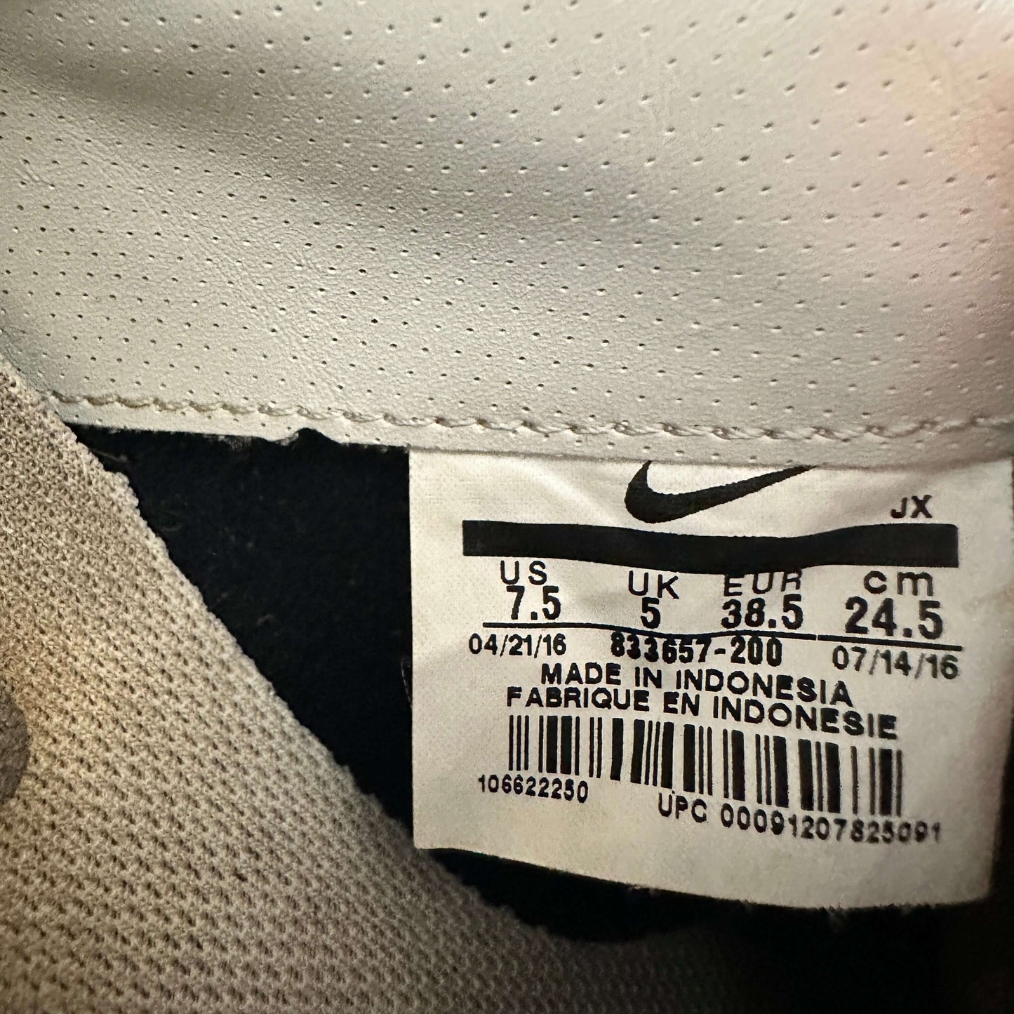 Nike Cortez label with size details: UK 5, EUR 38.5, US 7.5 on sneaker tag.