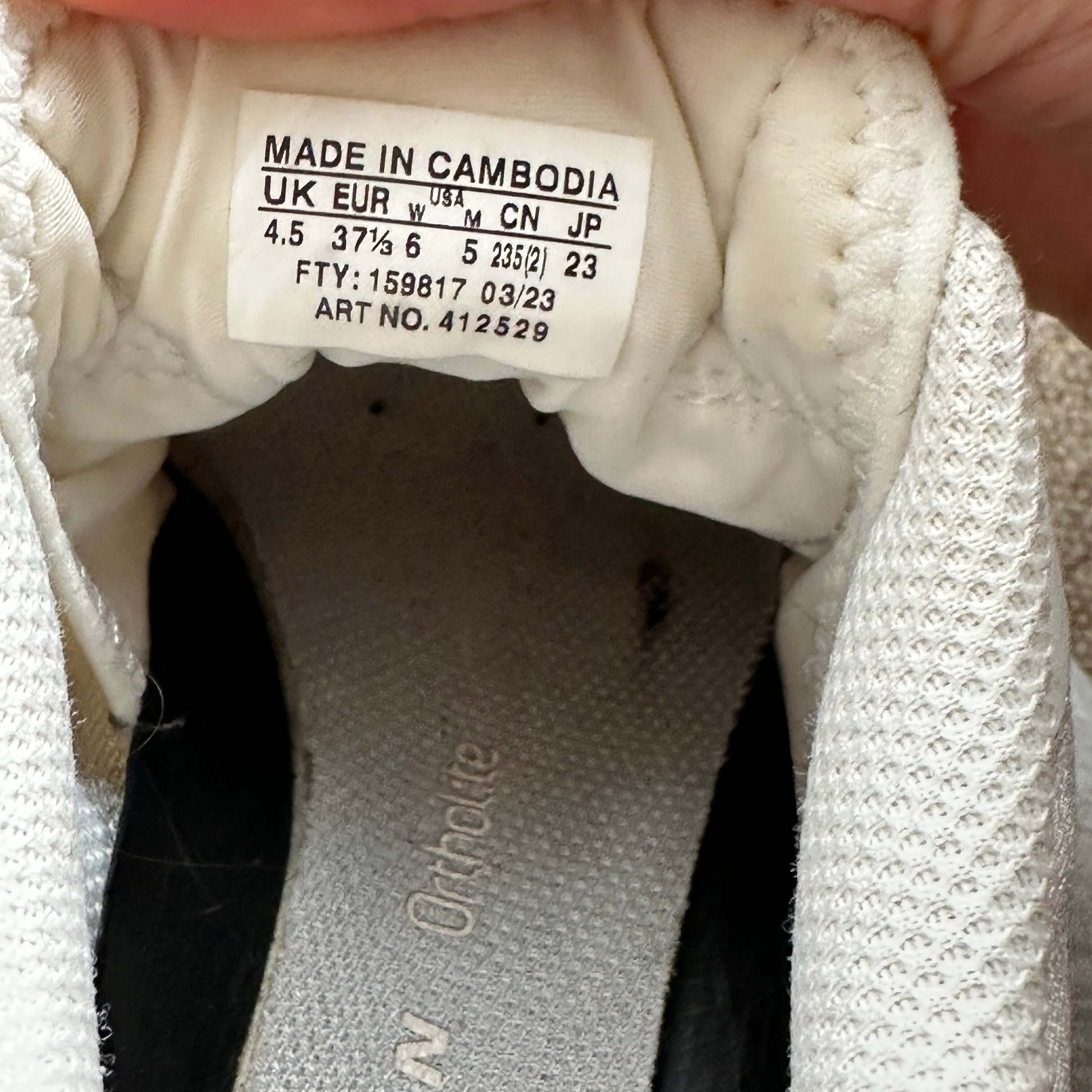 Label inside Salomon XT-6 white lunar rock sneakers, showing size 4.5 UK, good preloved condition.